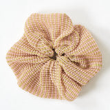 Dahlia Scrunchie in pink, knitted with glitter stripes