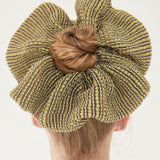 Dahlia Scrunchie in gold, knitted with glitter stripes
