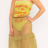Bubble Midi Skirt in khaki is a transparent knitted trumpet skirt in a ribbed bubble texture. The skirt has a body fitted upper part and voluminous bottom. Detailed with ruffles and a melange rim with logo in the back. the textile is lightweight, delicate and very flexible, meaning the skirt adapts to body wearing it. The Bubble Midi Skirt is also available in black and comes in 2 different sizes.