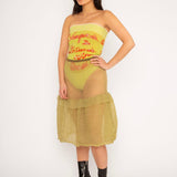 Bubble Midi Skirt in khaki is a transparent knitted trumpet skirt in a ribbed bubble texture. The skirt has a body fitted upper part and voluminous bottom. Detailed with ruffles and a melange rim with logo in the back. the textile is lightweight, delicate and very flexible, meaning the skirt adapts to body wearing it. The Bubble Midi Skirt is also available in black and comes in 2 different sizes.