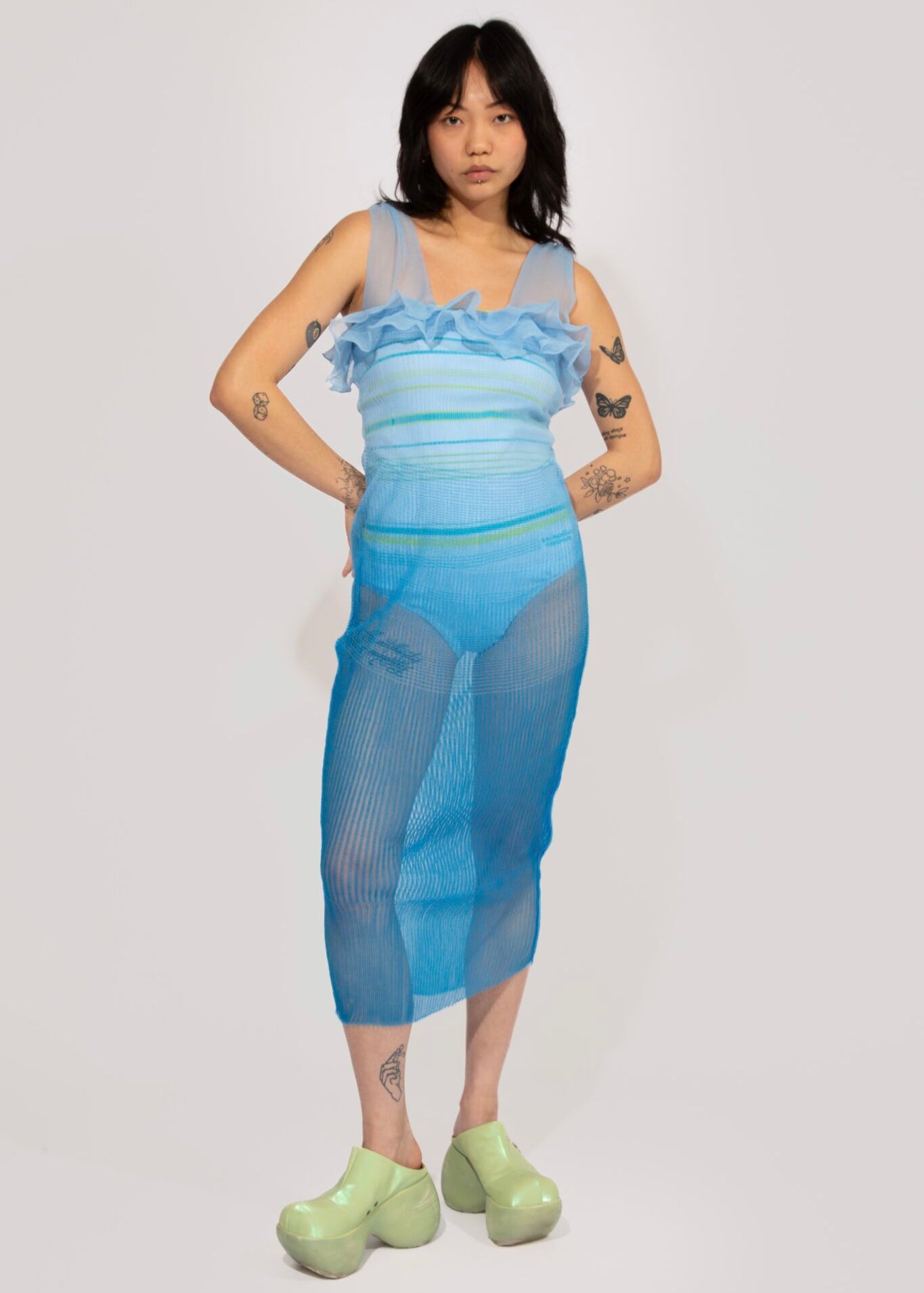 Secret Gradient knitted Dress in transparant gradient blue shades, with sporty stripe body