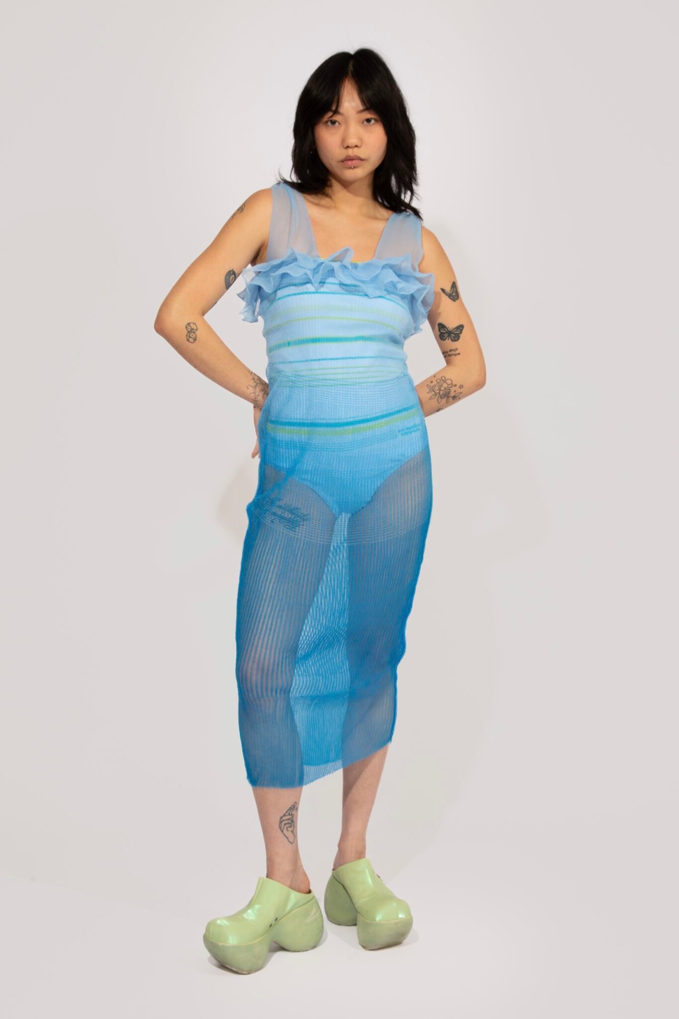 Secret Gradient knitted Dress in transparant gradient blue shades, with sporty stripe body