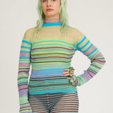 Sweet Secret Jumper in green and turquoise is a knitted transparent high neck jumper in all over bold stripes detailed with shimmery metallized yarn. The textile is lightweight, delicate and very flexible. The jumper has a body fitted silhouette that adapts to the body. Detailed with frills and a logo in the back of the neck.