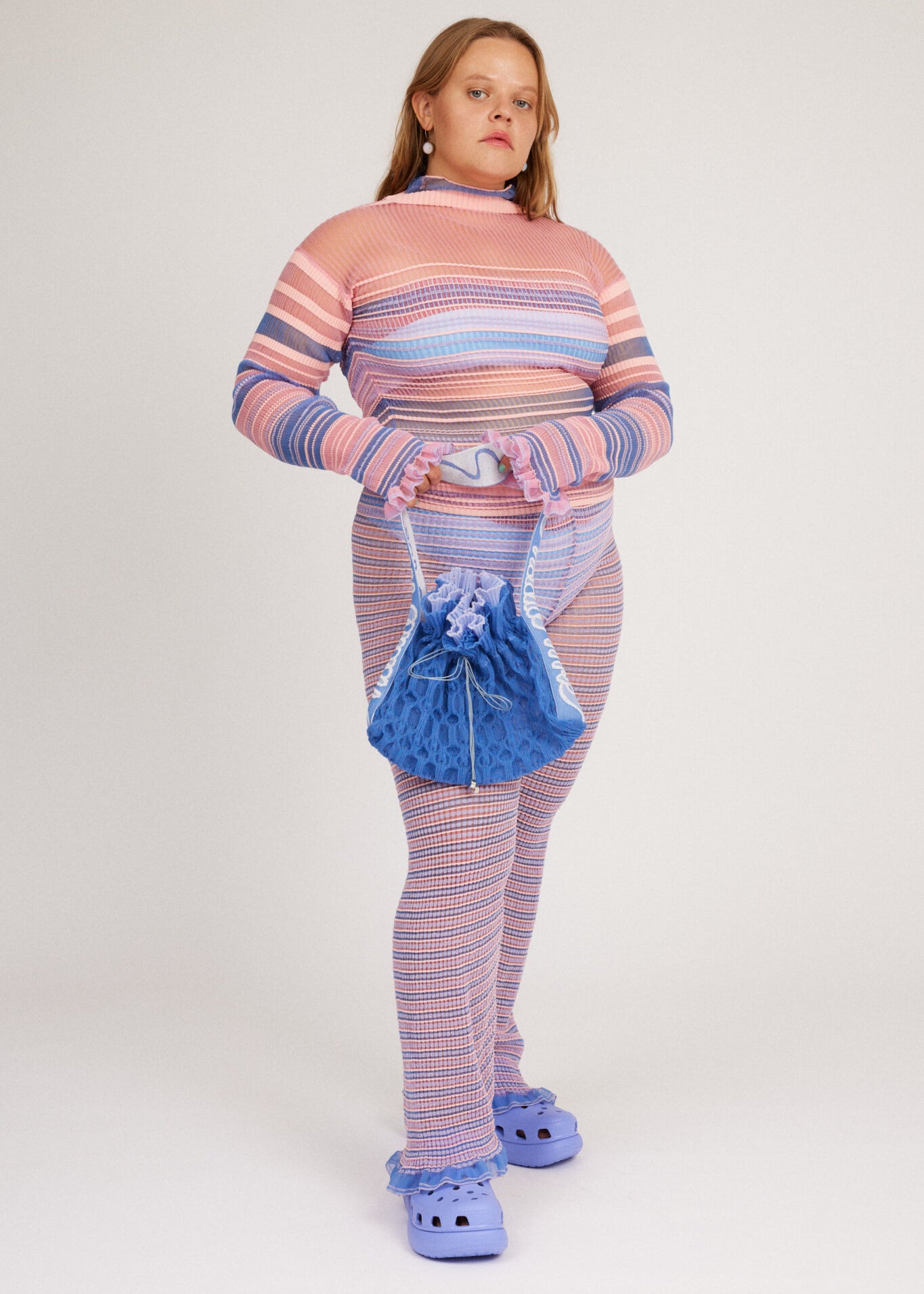 Bubble Frill Bag in powder blue, knitted transparent cinch bag