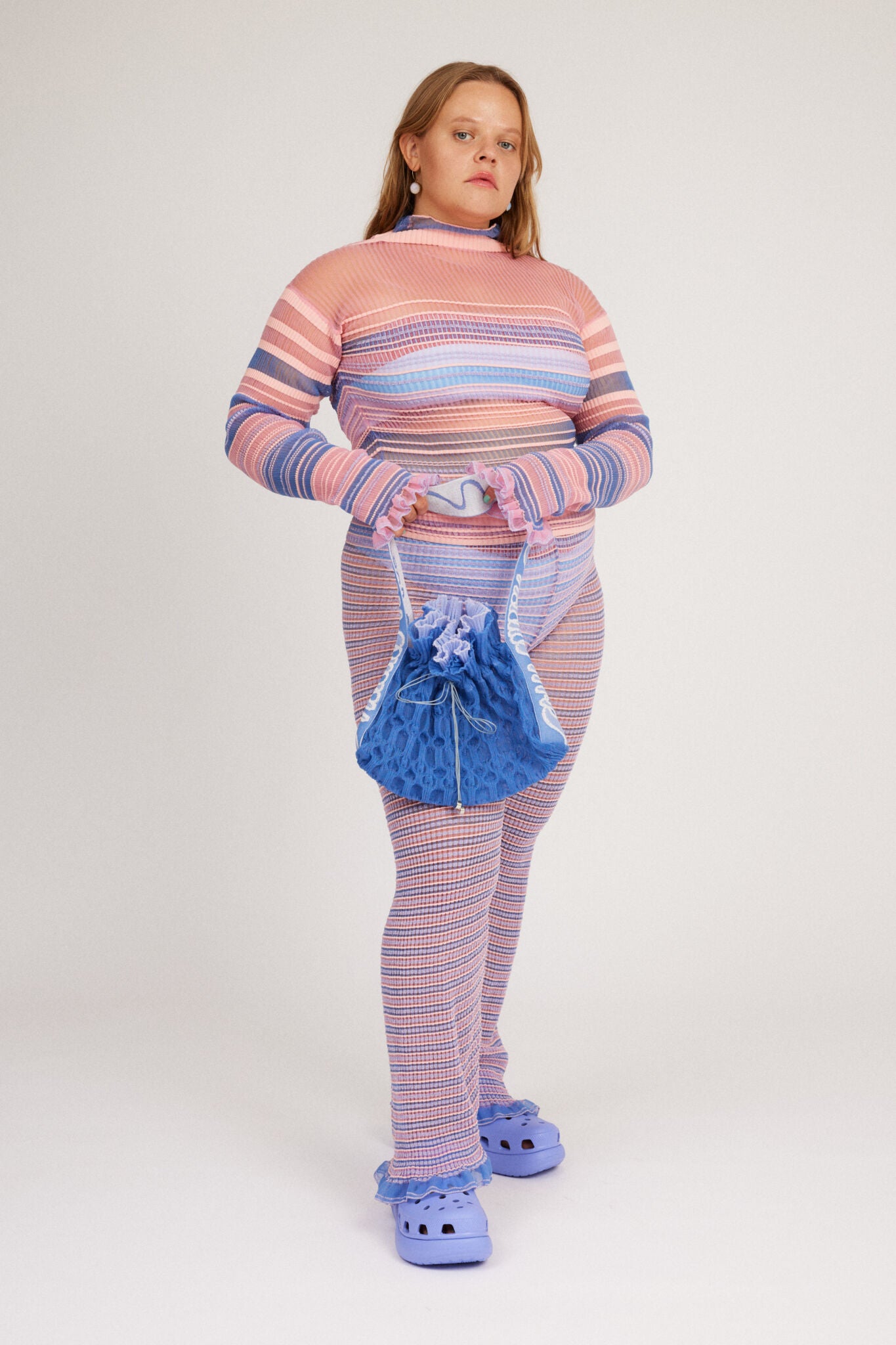 Bubble Frill Bag in powder blue, knitted transparent cinch bag