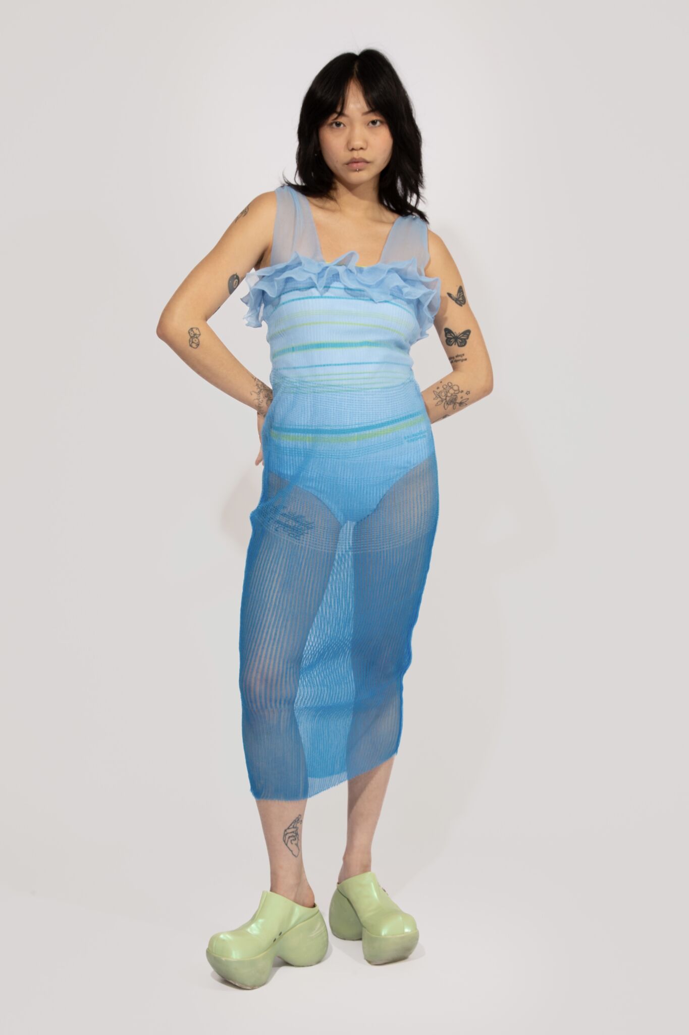 Secret Gradient knitted Dress in transparant gradient blue shades, with sporty stripe body